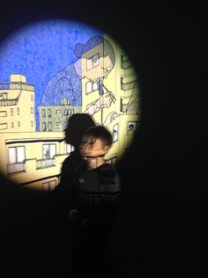 Spider Boy engaging with the art